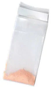 Clear resealable plastic bag with orange powder, medical supply packaging