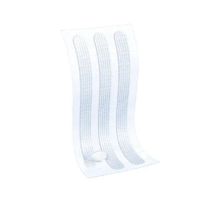 Sterile wound closure strips on a white adhesive medical bandage sheet