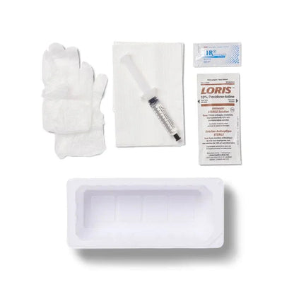 Sterile medical dressing kit with gloves, syringe, antiseptic swab, gauze, and tray on white background