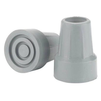 Gray rubber cane tips for walking aids, mobility accessory, two pieces on white background.