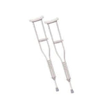 Pair of adjustable aluminum crutches with padded grips and tips on white background
