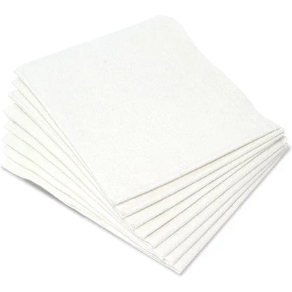 Stack of white disposable medical towels for home care or esthetic use on white background