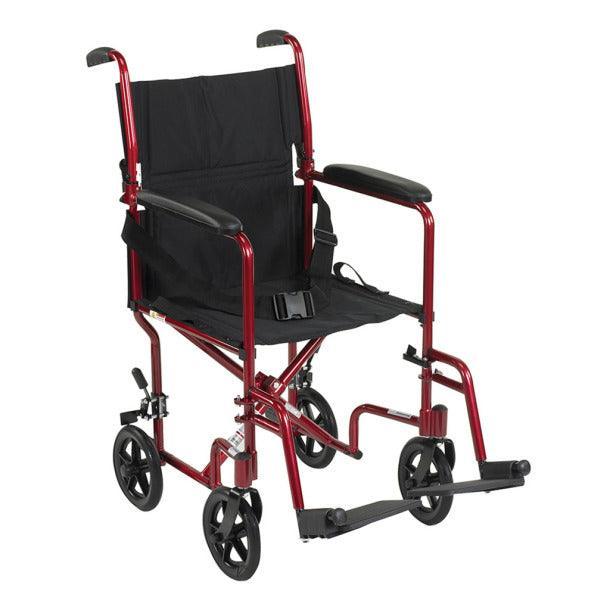 Lightweight red folding transport wheelchair with black seat and footrests