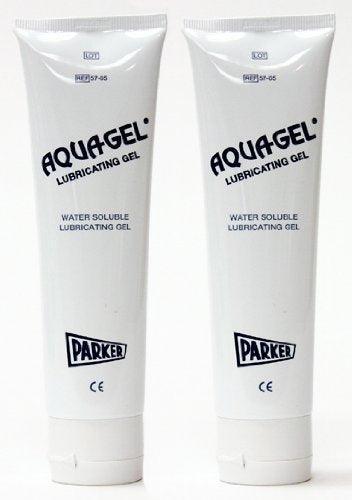 Two tubes of Aquagel water soluble lubricating gel for medical use on white background