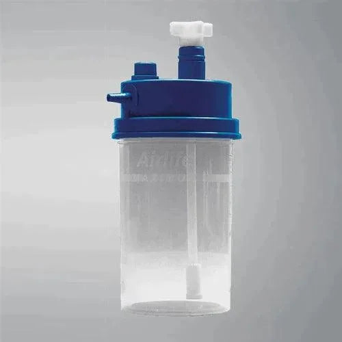 Medical oxygen humidifier bottle with blue cap and clear chamber for respiratory therapy