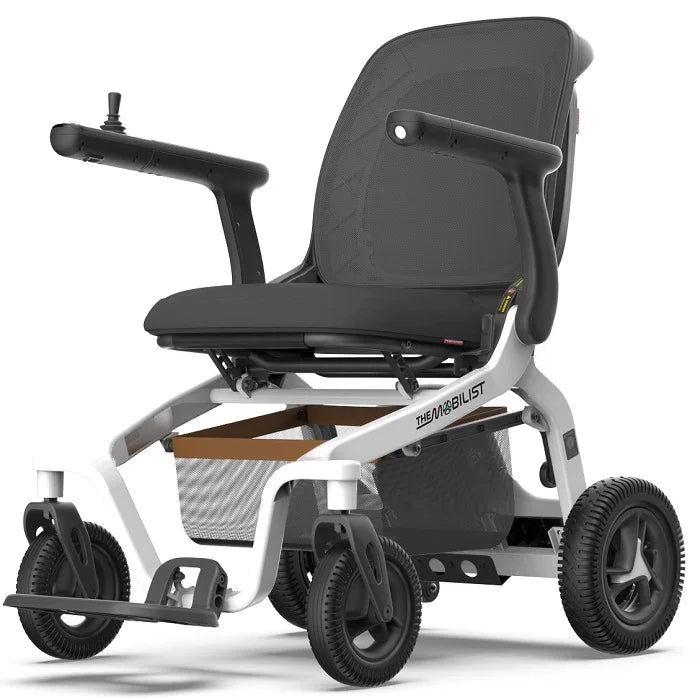 Lightweight electric wheelchair with joystick control, large wheels, and mesh backrest.