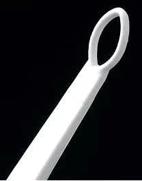 White plastic medical loop tool on black background, home care and esthetic supply