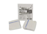 Sterile gauze sponges with blue stitched edges in front of medical supply packaging