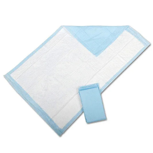 Disposable bed underpads with waterproof blue backing, used for incontinence care