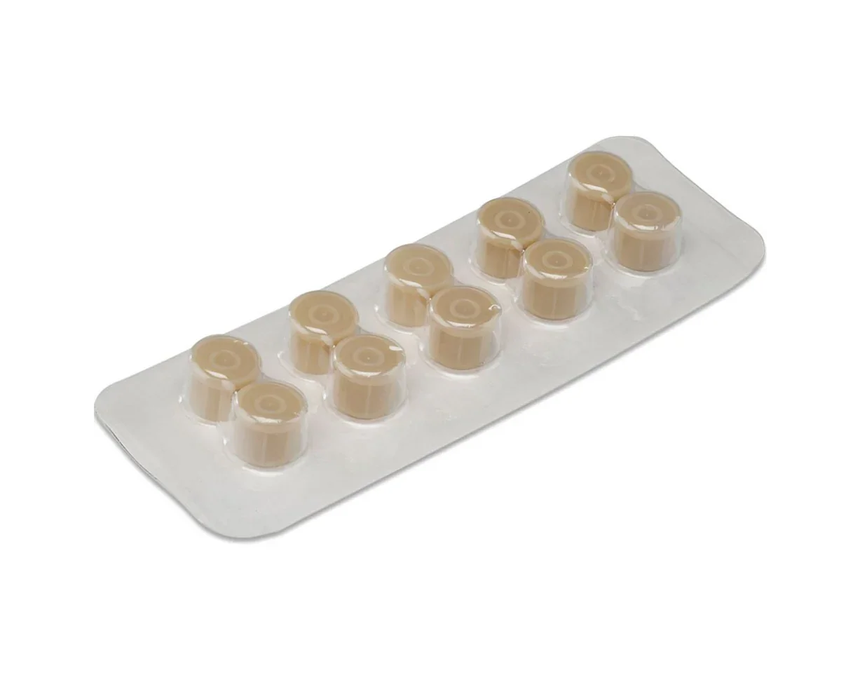 Blister pack of beige medical caps, sterile disposable IV line accessories