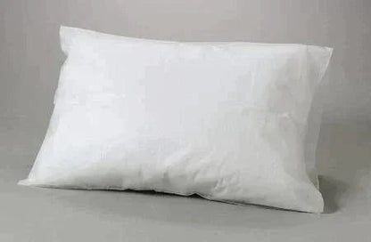 White disposable medical pillow on a grey background, healthcare bedding supply