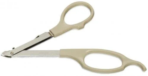 Medical bandage scissors with beige handles for healthcare and first aid use
