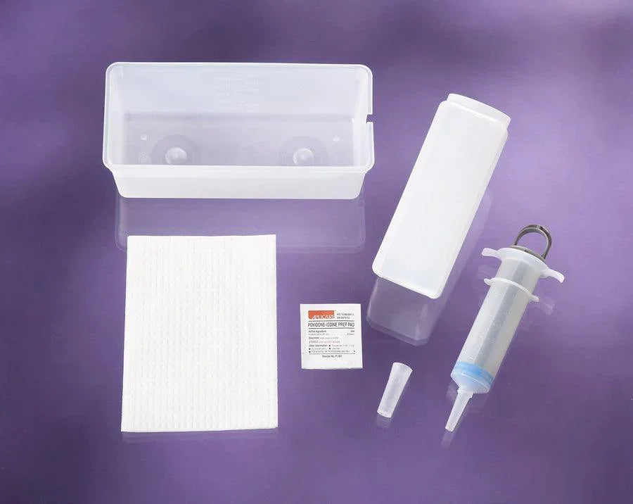 Medical wound care kit with syringe, tray, gauze pad, alcohol prep pad, and plastic container on purple background