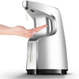 Automatic touchless soap dispenser with a hand receiving liquid soap, home care hygiene