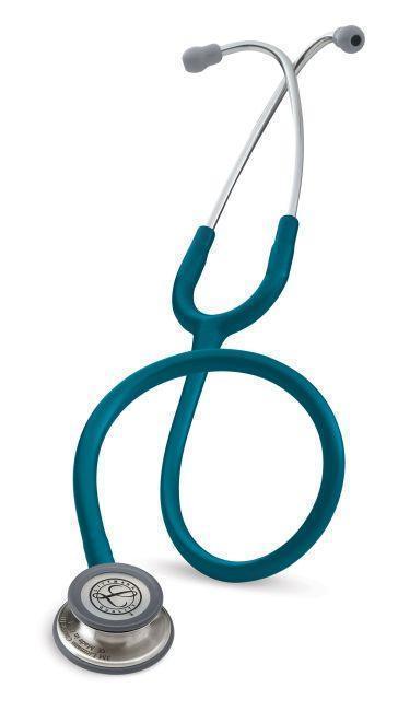Blue medical stethoscope with stainless steel chest piece on white background