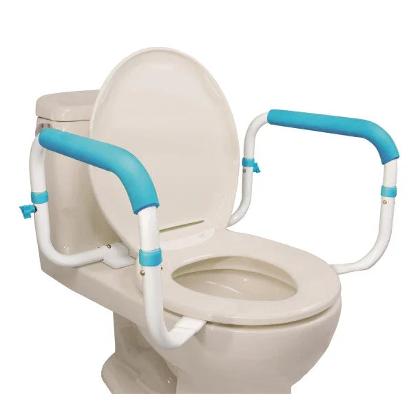 Toilet safety rails with blue padded handles attached to a standard toilet for mobility support