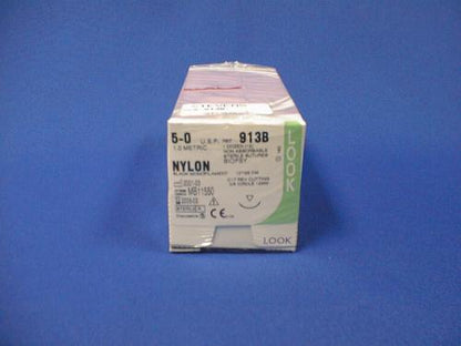 Nylon surgical sutures 5-0 size sterile box with product labeling on blue background