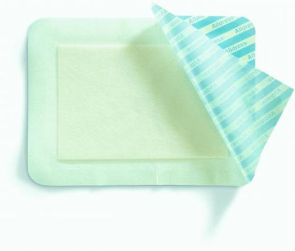 Sterile adhesive wound dressing for medical use, one corner peeled back