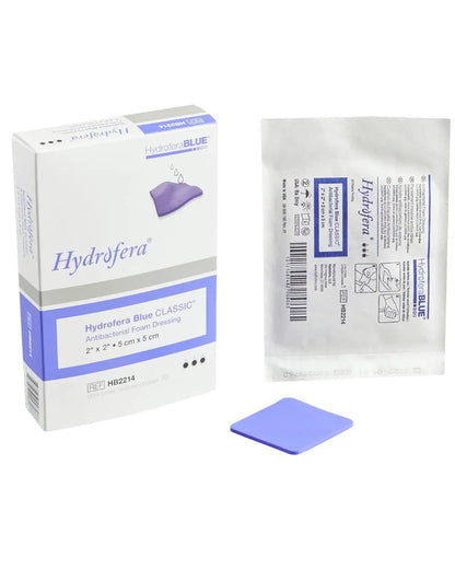 Hydrofera Blue antibacterial foam dressing 2x2 inch, box, sterile packet, and blue pad
