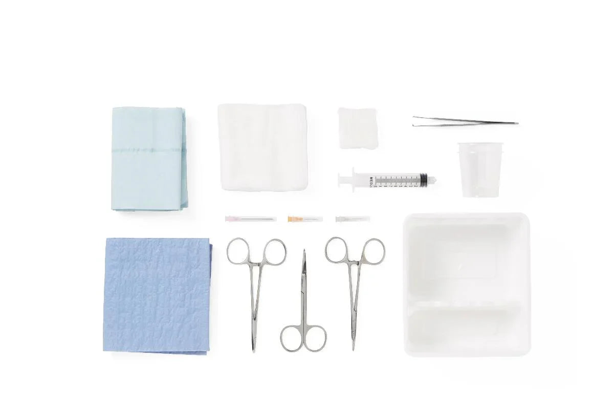 Medical procedure kit with gauze, scissors, forceps, syringe, tray, and drapes on white background