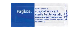 Surgilube sterile surgical lubricant single-use packet, 3g, medical supply packaging.