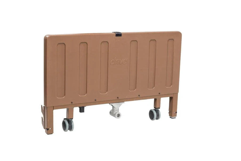 Electric low height hospital bed footboard with wheels on a white background