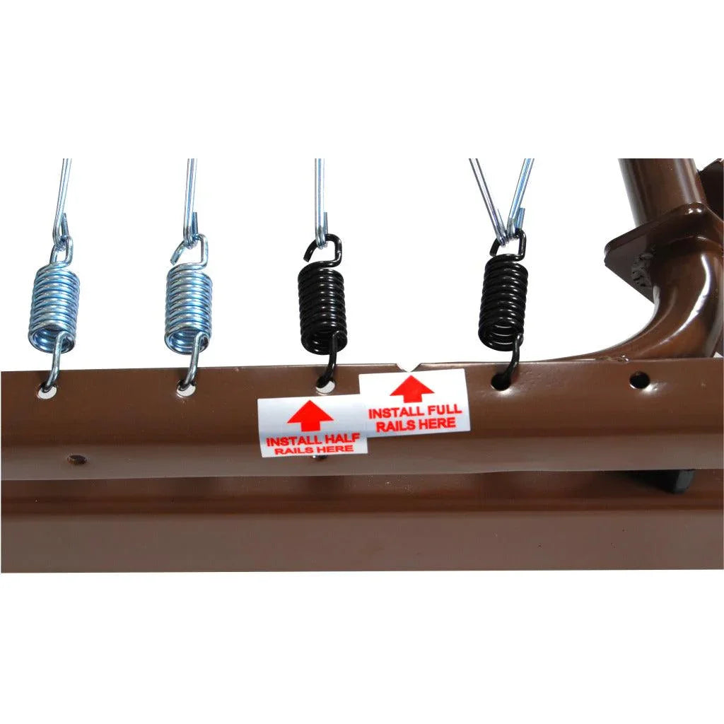 Close-up of electric hospital bed frame rail with metal springs and rail installation labels