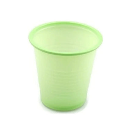 Green disposable plastic cup for medical or home care use, isolated on white background
