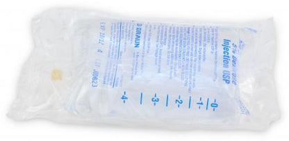 Sterile IV saline solution bag sealed in clear plastic, medical supply for healthcare use