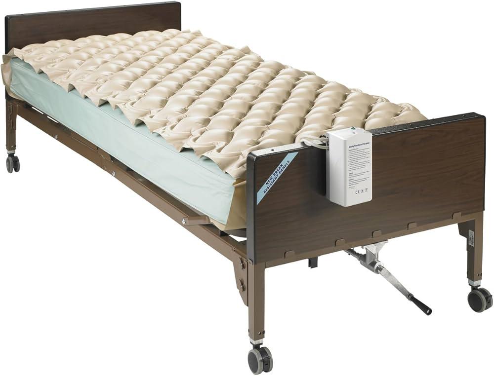 Hospital bed with beige air alternating pressure mattress for home care or long-term care