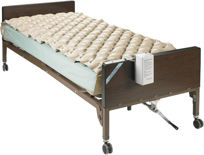 Hospital bed with adjustable air mattress and electric pump, ideal for home care