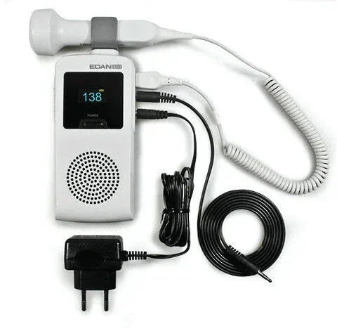 Portable fetal Doppler device with LCD display, probe, coiled and straight cables, and power adapter