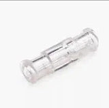 Clear plastic IV connector for medical and home care use on a white background