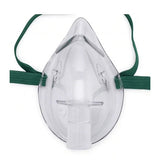 Clear oxygen mask with green elastic strap for respiratory therapy and medical use