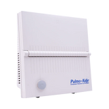 Pulmo-Aide compressor nebulizer medical device with white plastic case on blue background
