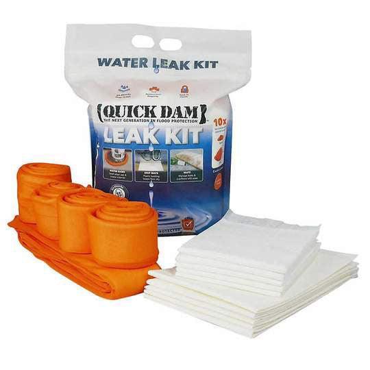 Quick Dam indoor water leak kit with orange absorbent barriers and white pads