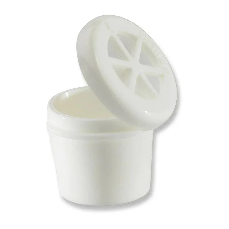 White tracheostomy speaking valve with open lid on plain background